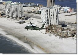 President George W. Bush aboard Marine One takes an aerial tour of damage caused by Hurricane Ivan in Orange Beach, Alabama, Sunday, Sept. 19, 2004. White House photo by Eric Draper.