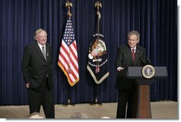 President George W. Bush appears on stage, Thursday, Oct. 6, 2005 at the Eisenhower Executive Office Building in Washington, with William F. Buckley, Jr., to honor the 50th anniversary of National Review magazine, which was founded by Buckley, and to recognize Buckley's upcoming 80th birthday.  White House photo by Paul Morse