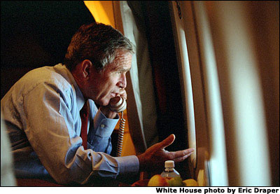 After departing Offitt Air Force Base, President Bush calls Vice President Cheney from Air Force One. White House photo by Eric Draper.