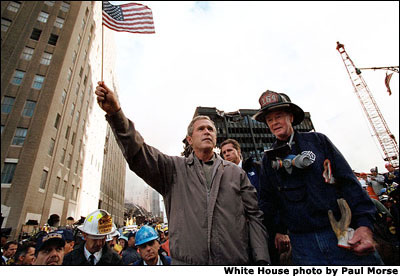 Standing upon the ashes of the worst terrorist attack on his country's soil, President Bush pledges that the voices from across America calling for justice will be heard Sept. 14. White House by Paul Morse.